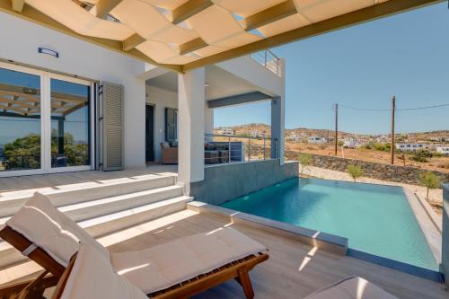 Bazén v ubytování Syraki Villas nebo v jeho okolí