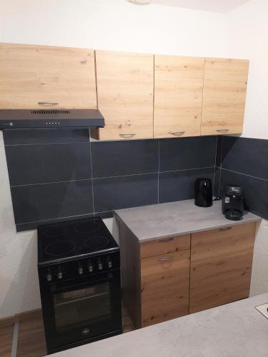 Η κουζίνα ή μικρή κουζίνα στο Cosy 2 - Audincourt centre