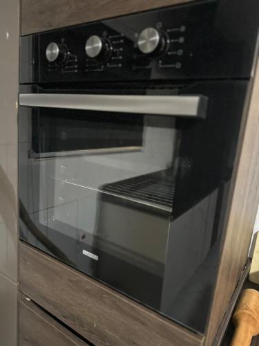 Una cocina o zona de cocina en Delim Suite