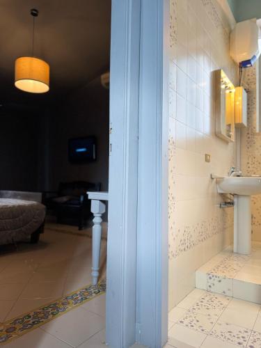 a bathroom with a sink in a room at B&B Assteas in Montesarchio