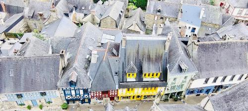 an aerial view of a town with many buildings at Gîte de l Archange in Josselin