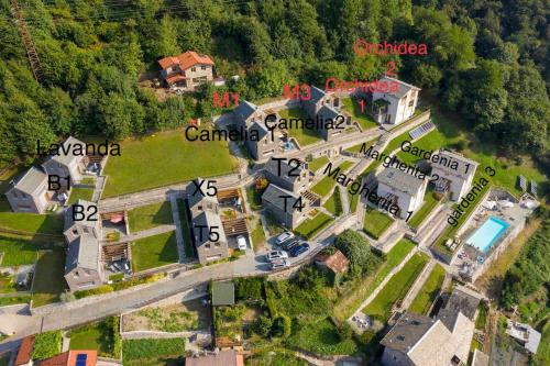 an aerial view of a house with a yard at house with 3 bedrooms T5 in Bellano
