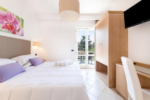 Cama o camas de una habitación en Villa Francesca Relais