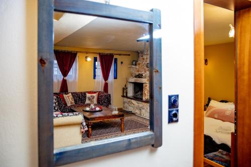 Postel nebo postele na pokoji v ubytování Arktouros Hotel