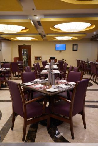 a conference room with a long table and chairs at Fortune Select JP Cosmos, Bengaluru - Member ITC Hotels' Group in Bengaluru