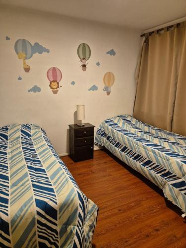 Ένα ή περισσότερα κρεβάτια σε δωμάτιο στο Casa Lupe - Veni a disfrutar