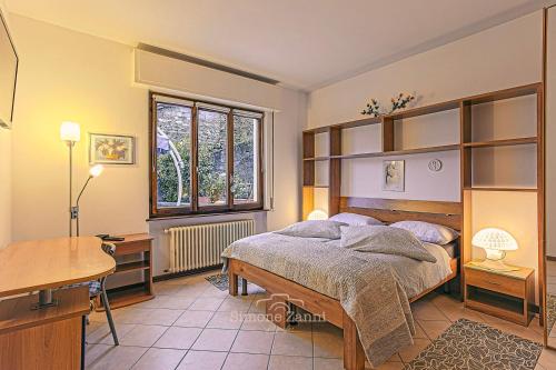 Ένα ή περισσότερα κρεβάτια σε δωμάτιο στο La Cà dal Nano