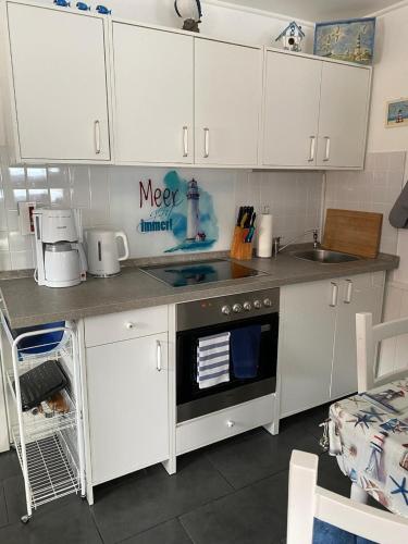 Una cocina o zona de cocina en Ferienwohnung Krüger