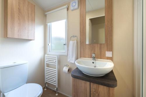 Koupelna v ubytování Cofton Holidays