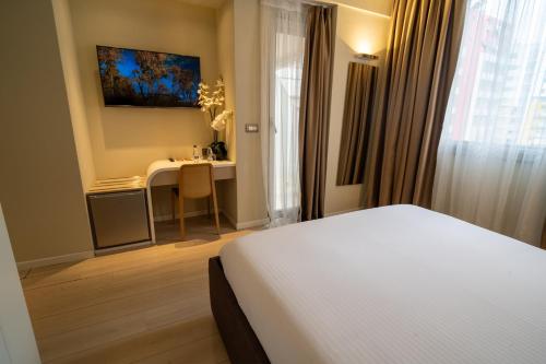 Ένα ή περισσότερα κρεβάτια σε δωμάτιο στο Lake Drive Rooms&Apartments
