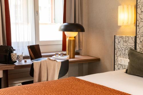 Ένα ή περισσότερα κρεβάτια σε δωμάτιο στο Hotel D - Basel - Fully Renovated 2025