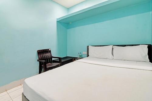 Postel nebo postele na pokoji v ubytování Hotel O NANDAN