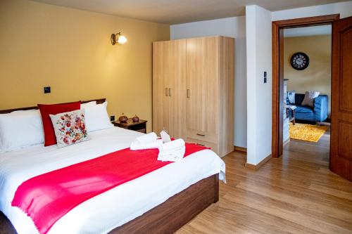 Postel nebo postele na pokoji v ubytování Arktouros Hotel