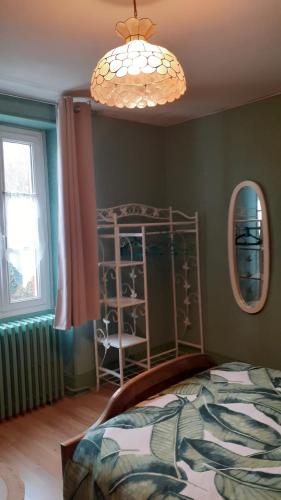 Postel nebo postele na pokoji v ubytování Gite des Belles Fontaines
