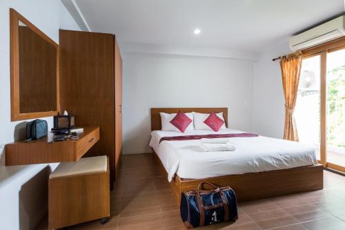Postel nebo postele na pokoji v ubytování Eco Hostel Hua Hin