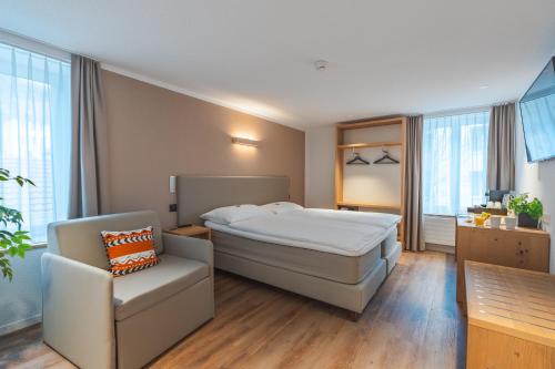 Postel nebo postele na pokoji v ubytování Hotel Artist