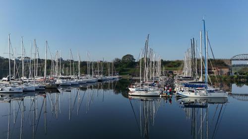 a bunch of boats are docked in a harbor at LifeHarbour Limanu in Limanu