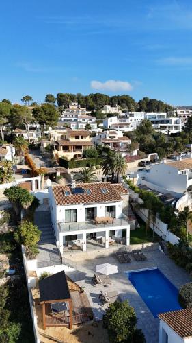 an aerial view of a resort with a swimming pool at The Villa by Los Limoneros in Teulada