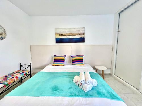 En eller flere senge i et værelse på Vilamoura Sea Village 2 by Homing