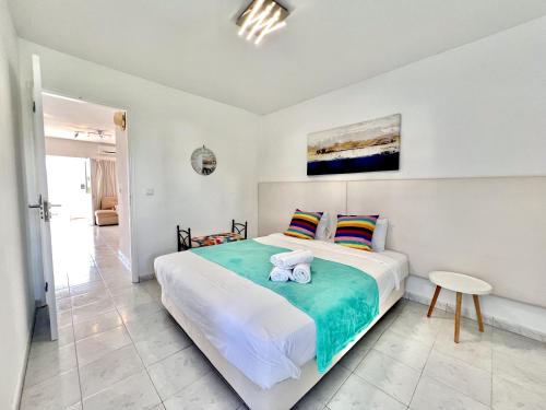 En eller flere senge i et værelse på Vilamoura Sea Village 2 by Homing