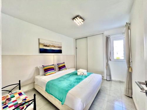 En eller flere senge i et værelse på Vilamoura Sea Village 2 by Homing