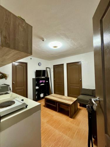 Kuchyň nebo kuchyňský kout v ubytování Tres Hermanas Condo - One Oasis CDO