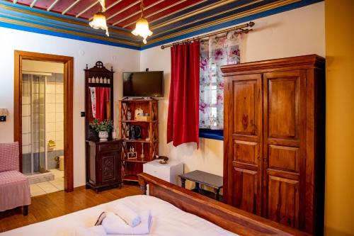 Postel nebo postele na pokoji v ubytování Arktouros Hotel