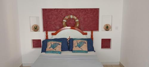 Postel nebo postele na pokoji v ubytování Tarrafal Relax