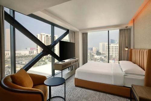 Postel nebo postele na pokoji v ubytování Sheraton Bahrain Hotel