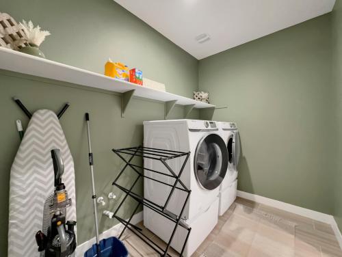 a washer and dryer in a laundry room at Staman Queen Creek in Queen Creek