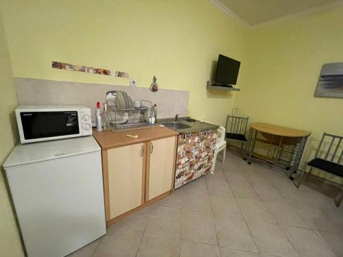 Η κουζίνα ή μικρή κουζίνα στο Breezz