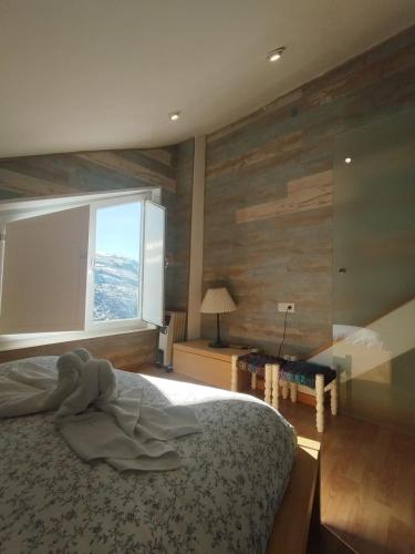 Giường trong phòng chung tại MIRAMAR Dúplex