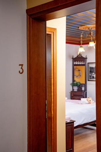 Postel nebo postele na pokoji v ubytování Arktouros Hotel
