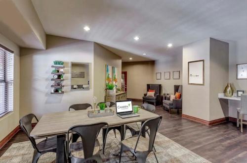 a dining room and living room with a table and chairs at Zen Oasis in Phoenix