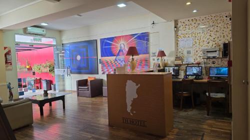 a store with a lobby with a desk and a counter at Hotel Juramento in Buenos Aires