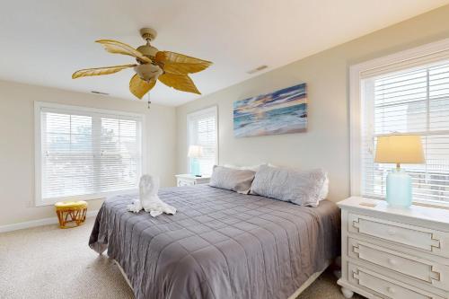 a bedroom with a bed and a ceiling fan at West Fenwick --- 39110 Van Buren Ave in Selbyville