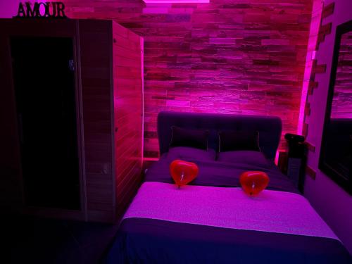 Una cama o camas en una habitación de L'Ecrin secret