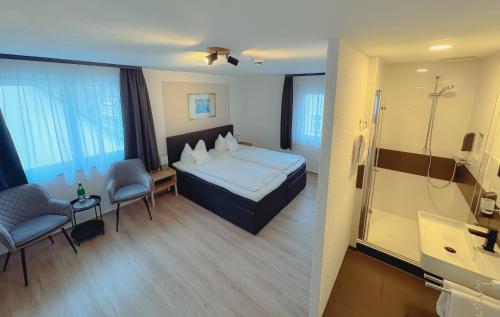 Ένα ή περισσότερα κρεβάτια σε δωμάτιο στο Landhotel Combecher