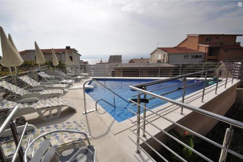 Apartment Joza with pool and sea view, 2 min walk to the beach