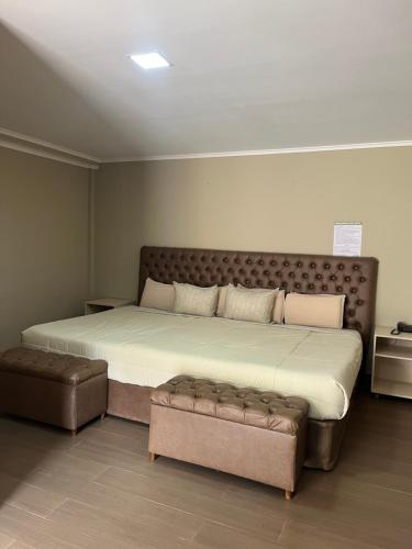 Postel nebo postele na pokoji v ubytování Hotel Yvera Cataratas
