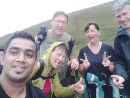 a group of people posing for a picture at Haritha Kanda Rest in Bogawantalawa