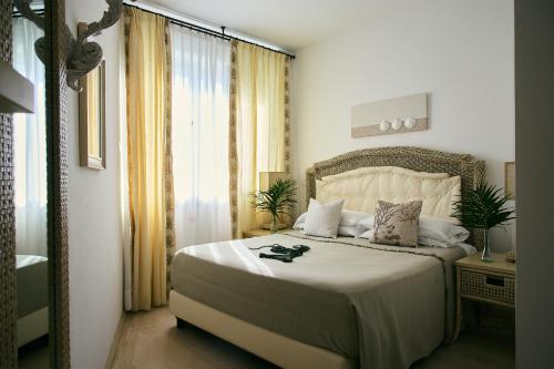 Ένα ή περισσότερα κρεβάτια σε δωμάτιο στο Relais Valle Dell'Idro
