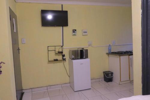 Η κουζίνα ή μικρή κουζίνα στο Zone 4 Motel