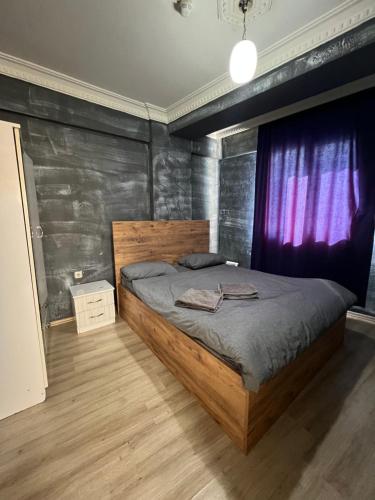 Postel nebo postele na pokoji v ubytování kızıl apart