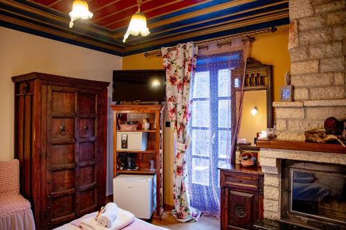 Kuchyň nebo kuchyňský kout v ubytování Arktouros Hotel