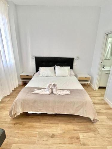 Postel nebo postele na pokoji v ubytování Escapada Acogedora cerca de IFEMA Madrid