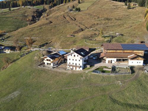 an aerial view of a house on a hill at Ratscheinerhof App Gipfelglück in Lazfons
