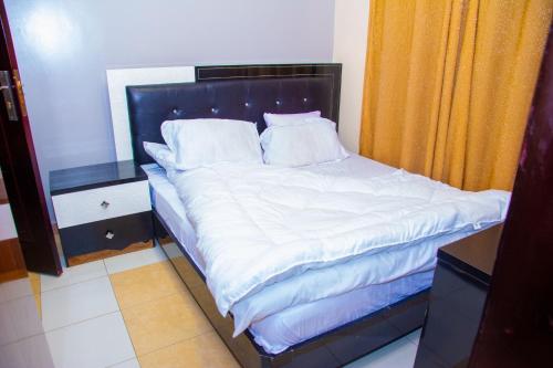 Ballote VILLA APARTにあるベッド