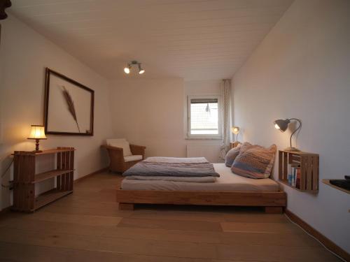 Ένα ή περισσότερα κρεβάτια σε δωμάτιο στο Ferienhaus im Bergdorf