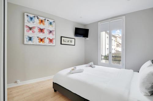 Postel nebo postele na pokoji v ubytování Le Jardin Anglais - 6p - Proche Gare